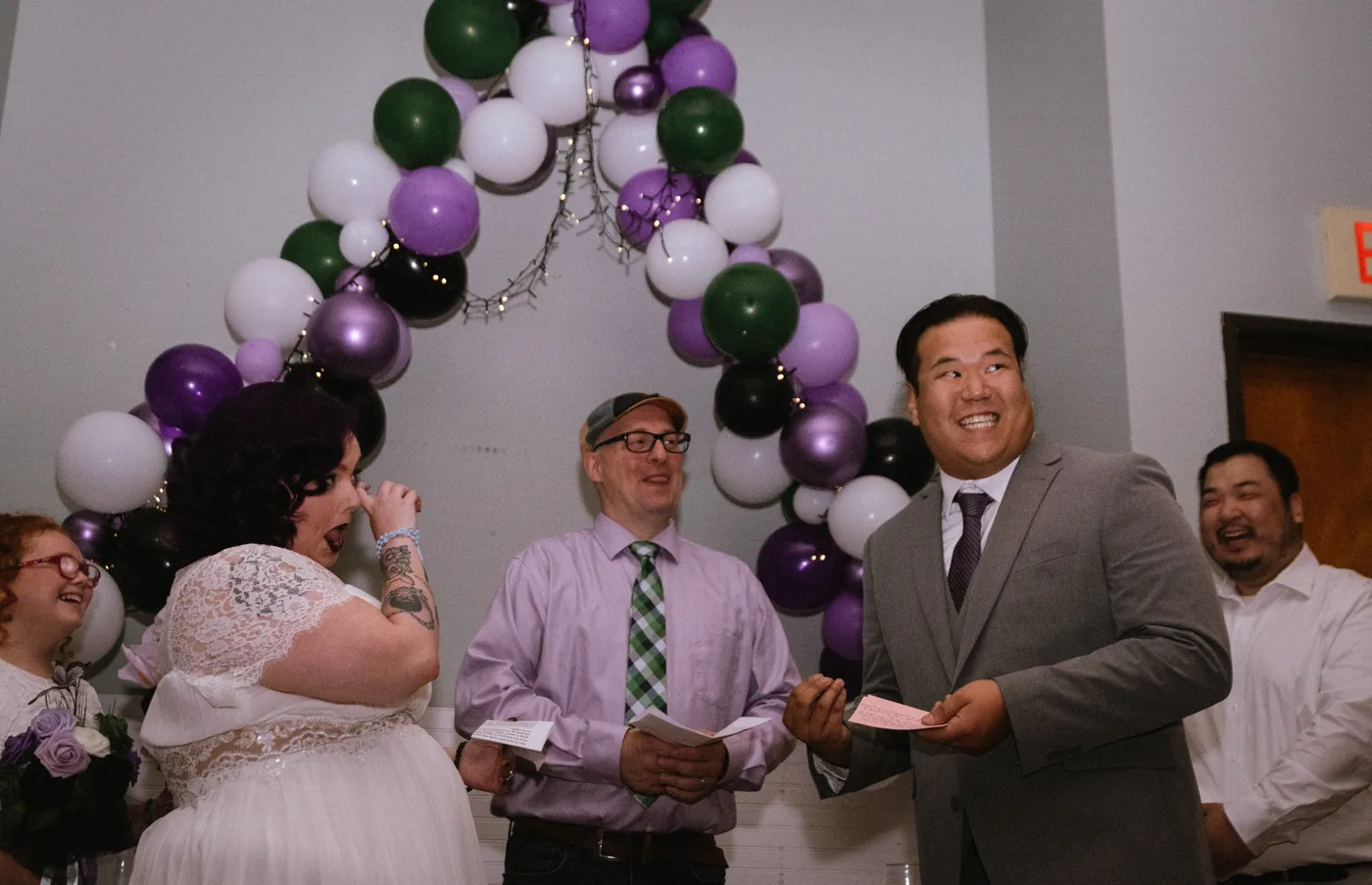Couple laughing during their ceremony