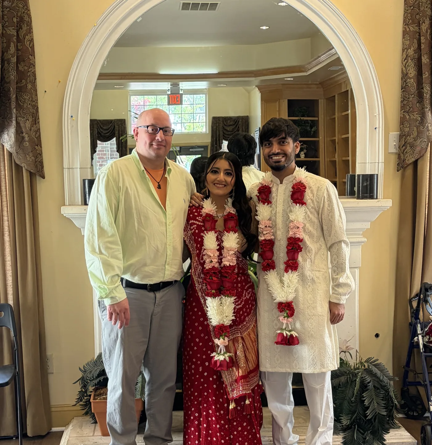 Traditional wedding couple with officiant